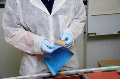Removing 3M™ Scotch-Weld™ Composite Surfacing Film AF 325 from its liner for application