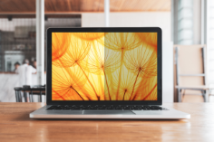 This asset is of Getty ID 1191266783. This is licensed from Getty Images and Shutterstock. Unlimited seats were licensed there is no charge to use this image. Please download and use as needed, but include Celum ID in Release Comments for new literature loaded to Celum that utilizes this asset. Title: Laptop computer blank white screen on table in cafe background. Laptop with blank screen on table of coffee shop blur background. This is retouched version of this Getty Image. The image on the Notebook screen has been altered by Display Materials & Solutions Division, DMSD. Shutterstock ID 165386396 photoshopped into Notebook screen.