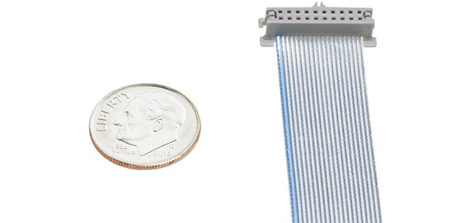 Image comparing the size of the wiremount socket connector versus a dime