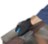 Hand sanding metal surface